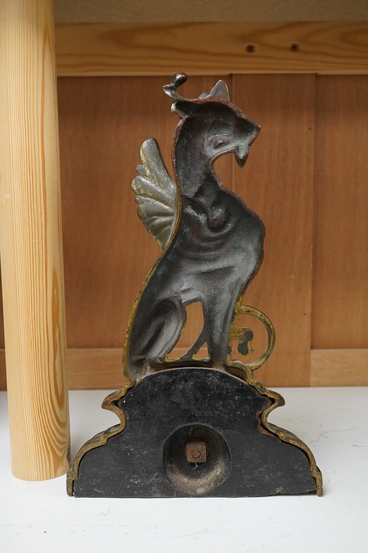 A Victorian gilt bronze doorstop in the form of a griffin, 27cm high